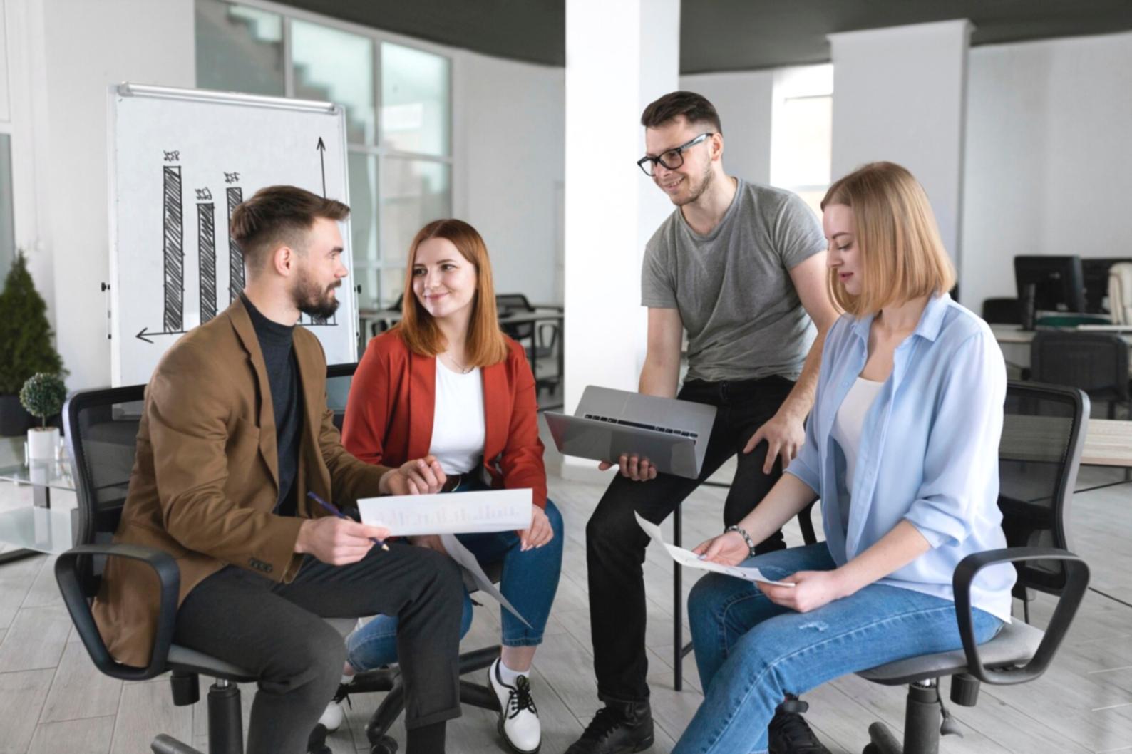 Participants working together on budget planning exercises